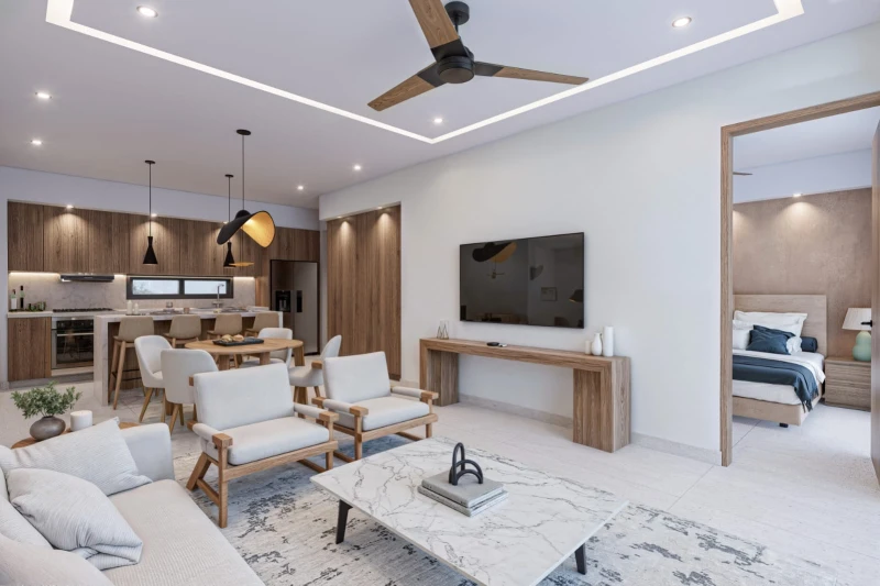 Open-plan living room with sofa, television and ceiling fan